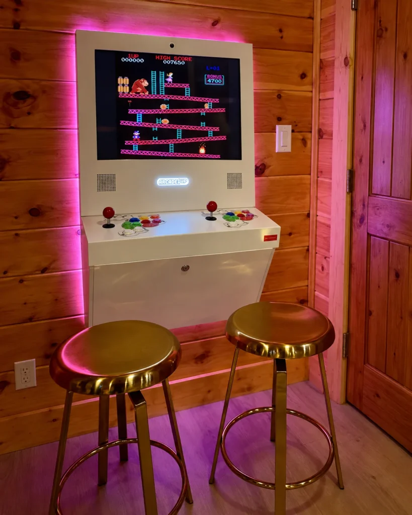 Two arcade controls and a pair of stools, ready for another round.