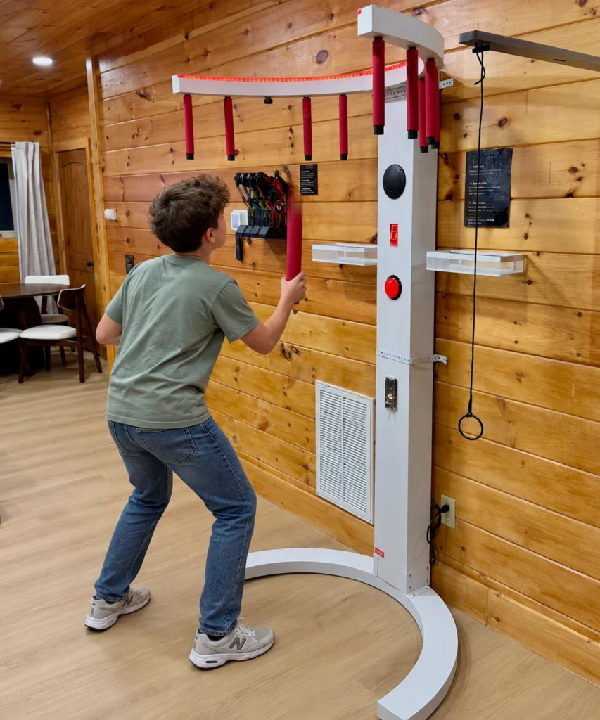 A player reaching for the drop sticks in the entertainment room.