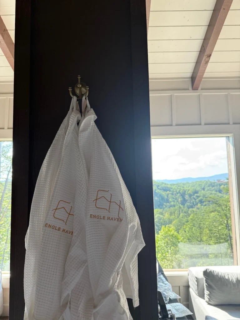 Engle Haven robes hang within reach of the pool-room seating.