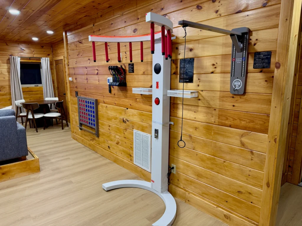 Connect Four, the drop-stick reaction game and Hook 21 together in the game room.