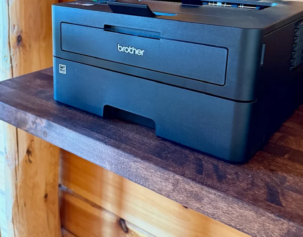 A guest printer on the upstairs landing for tickets, passes and travel plans.