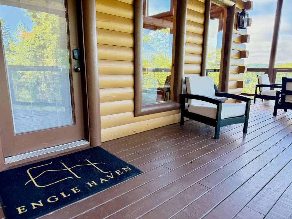 The Engle Haven mat and deck seating beside the cabin door.